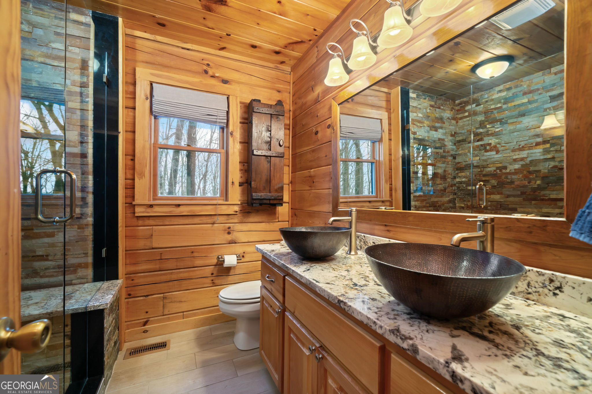 541 Little Bushy Head Road, Unit 271 Blue Ridge, GA 30513 - Photo 15 of 43 a view of a bathroom with a granite countertop tub and a sink