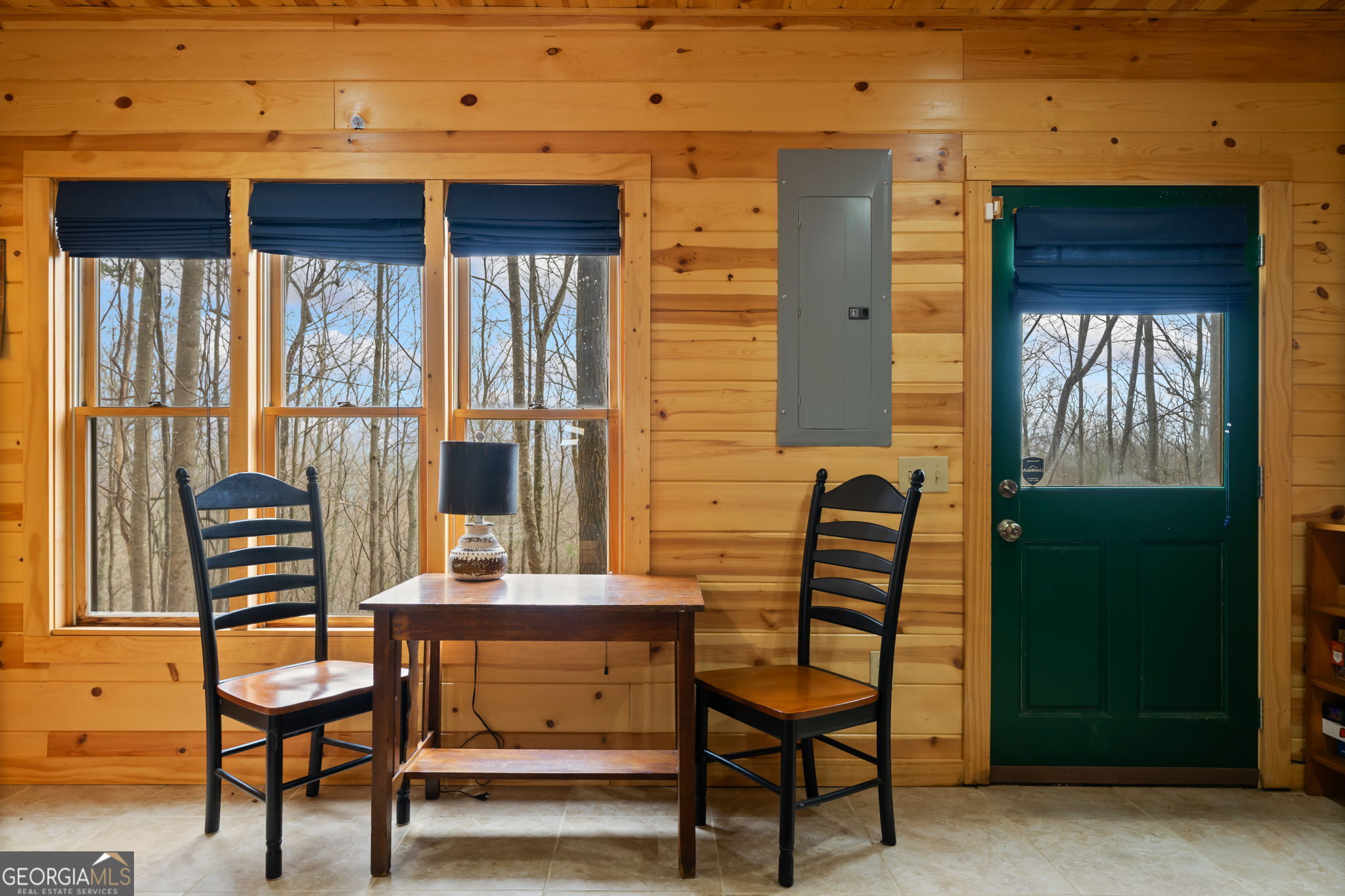 541 Little Bushy Head Road, Unit 271 Blue Ridge, GA 30513 - Photo 24 of 43 a view of two chairs and a table in the patio