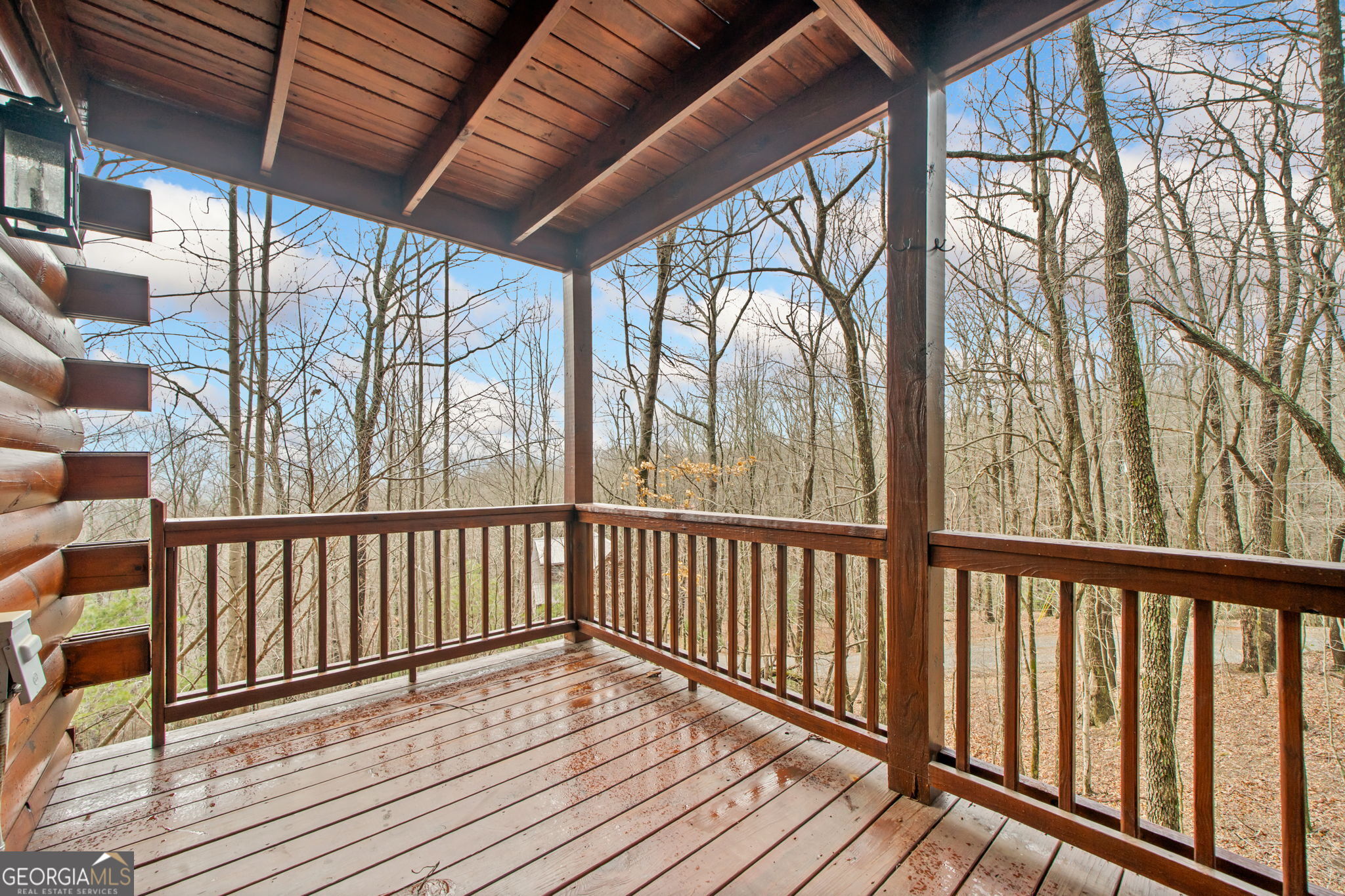 541 Little Bushy Head Road, Unit 271 Blue Ridge, GA 30513 - Photo 32 of 43 a view of wooden balcony with wooden floor