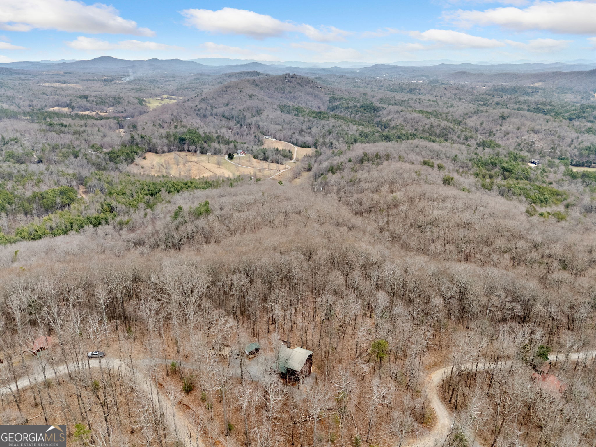 541 Little Bushy Head Road, Unit 271 Blue Ridge, GA 30513 - Photo 40 of 43 a view of a dry yard with green space