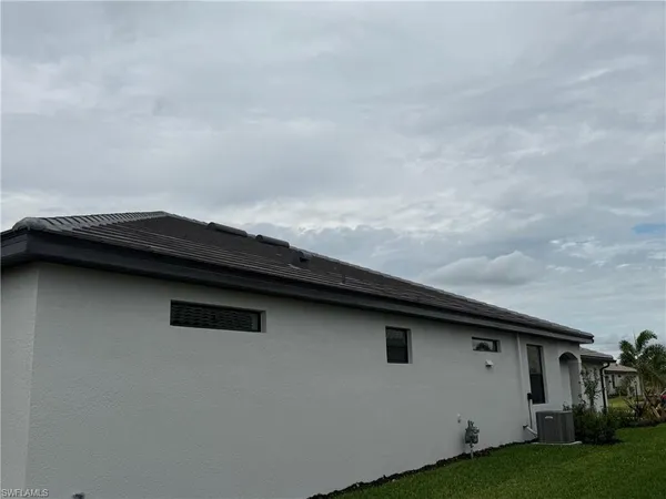 a view of a back yard of the house