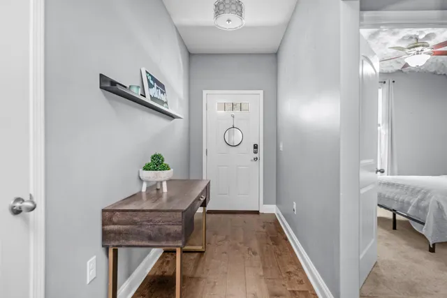 a workspace with furniture and wooden floor