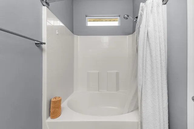 a bathroom with a bathtub