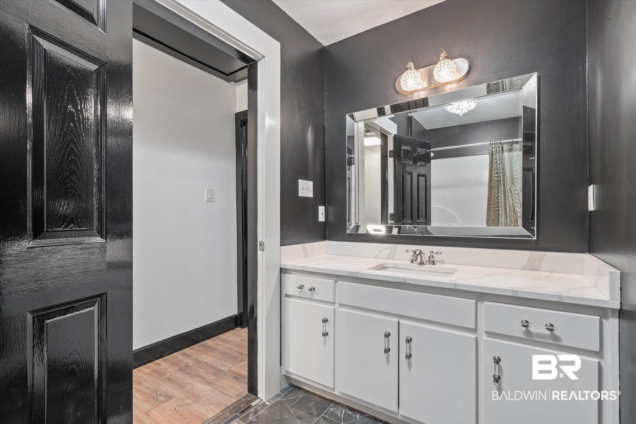 3216 Bay Booster Club Road Theodore, AL 36582 - Photo 18 of 46 Bathroom featuring vanity and a shower with curtain