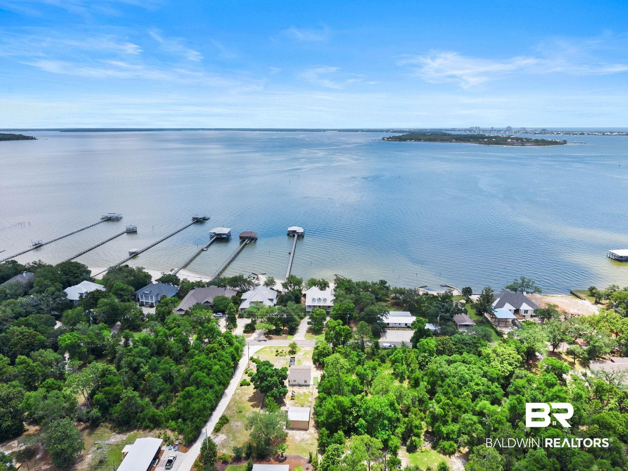 6802 Shore Drive Elberta, AL 36530 - Photo 31 of 34 Expansive waterfront property featuring multiple private docks and a sandy shoreline