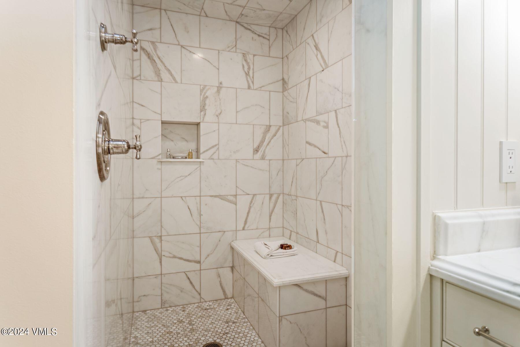 1 Willow Bridge Road, Unit 22D Vail, CO 81657 - Photo 18 of 39 a bathroom with a sink a toilet and shower