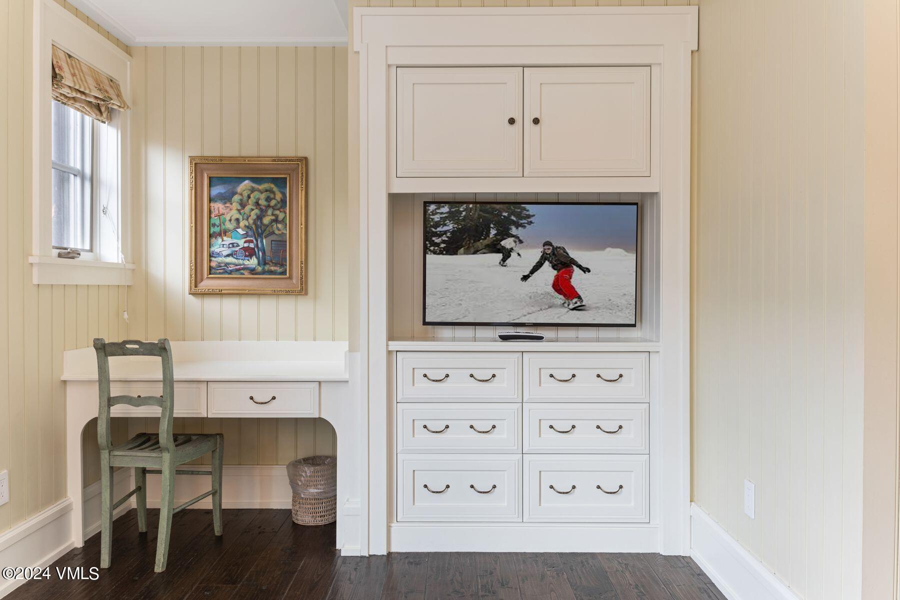 1 Willow Bridge Road, Unit 22D Vail, CO 81657 - Photo 28 of 39 a view of cabinets with wooden floor and furniture
