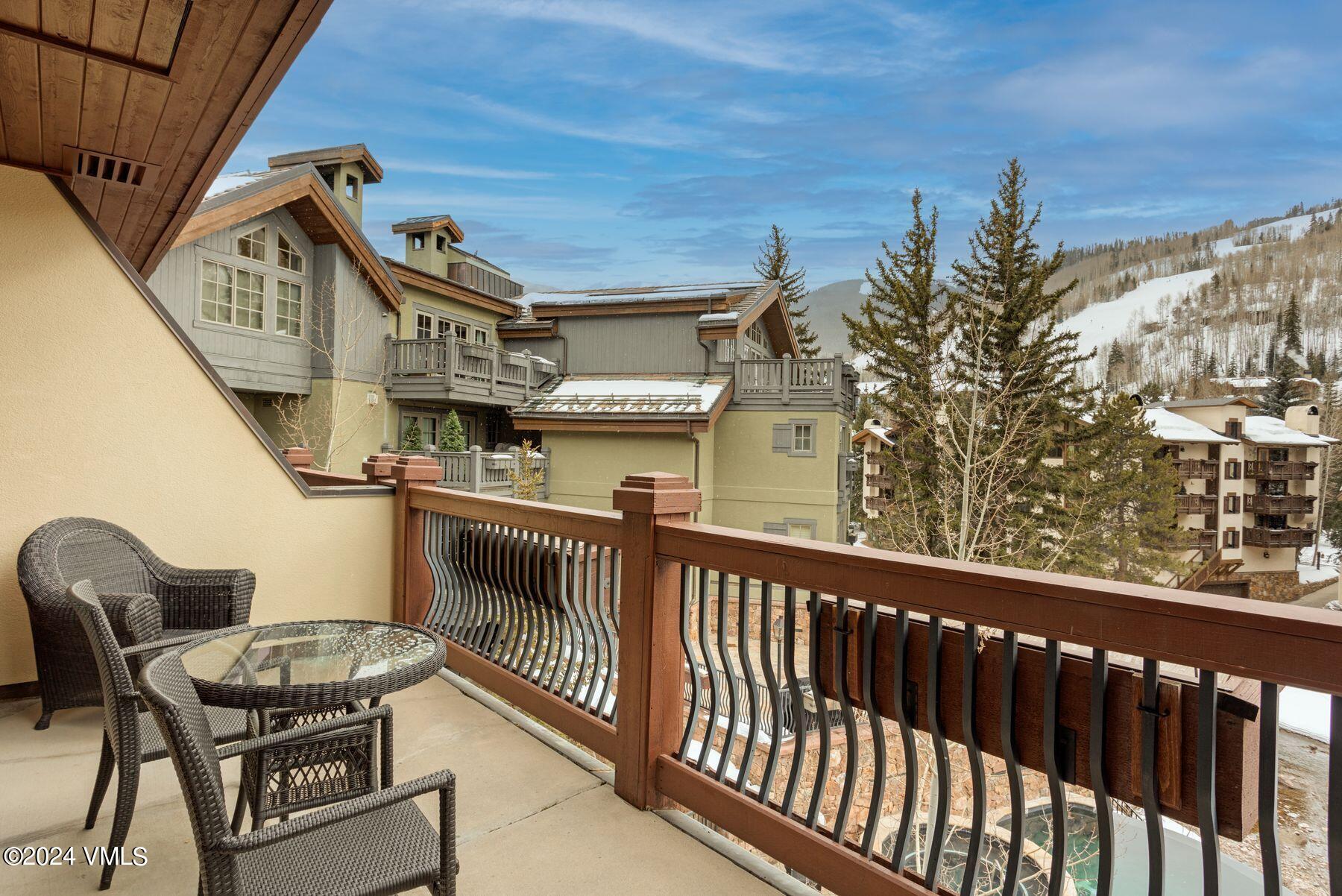 1 Willow Bridge Road, Unit 22D Vail, CO 81657 - Photo 6 of 39 a view of a balcony with furniture