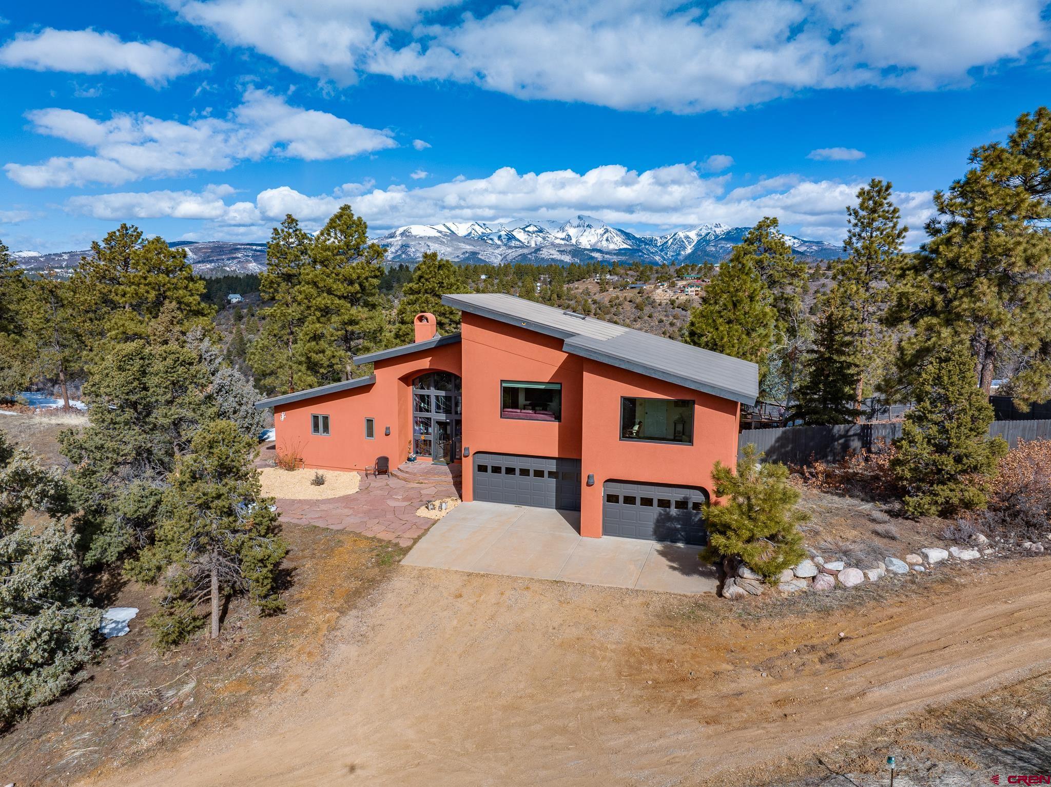 925 Ridge Road Durango, CO 81303 - Photo 1 of 1 front view of a house with a yard