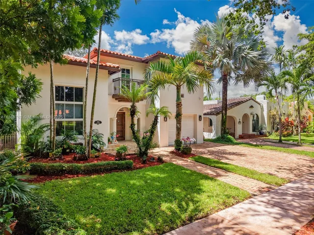 an aerial view of a house with a garden