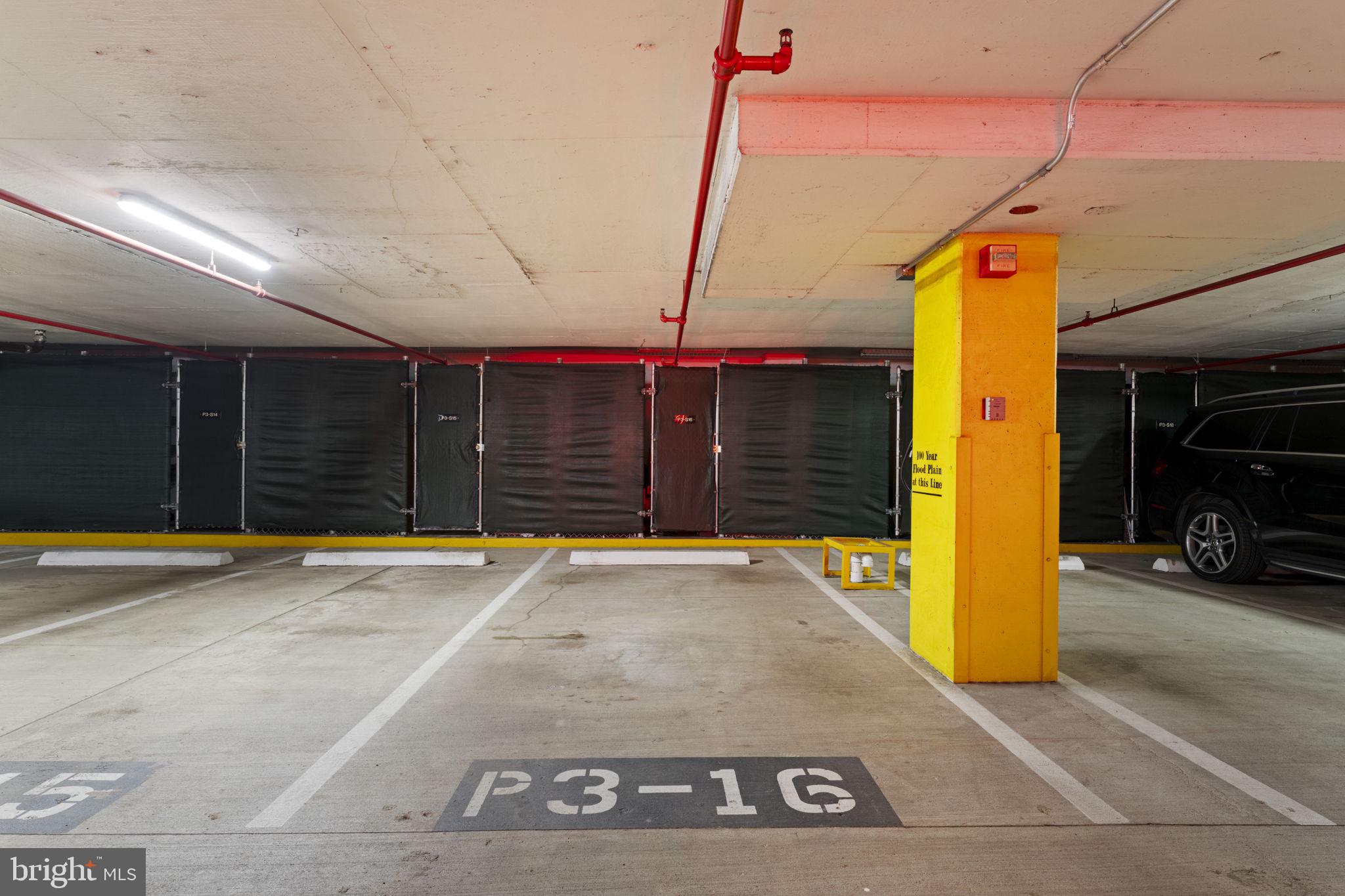 3303 Water Street Northwest, Unit 4B Washington, DC 20007 - Photo 33 of 66 a view of a house with a garage