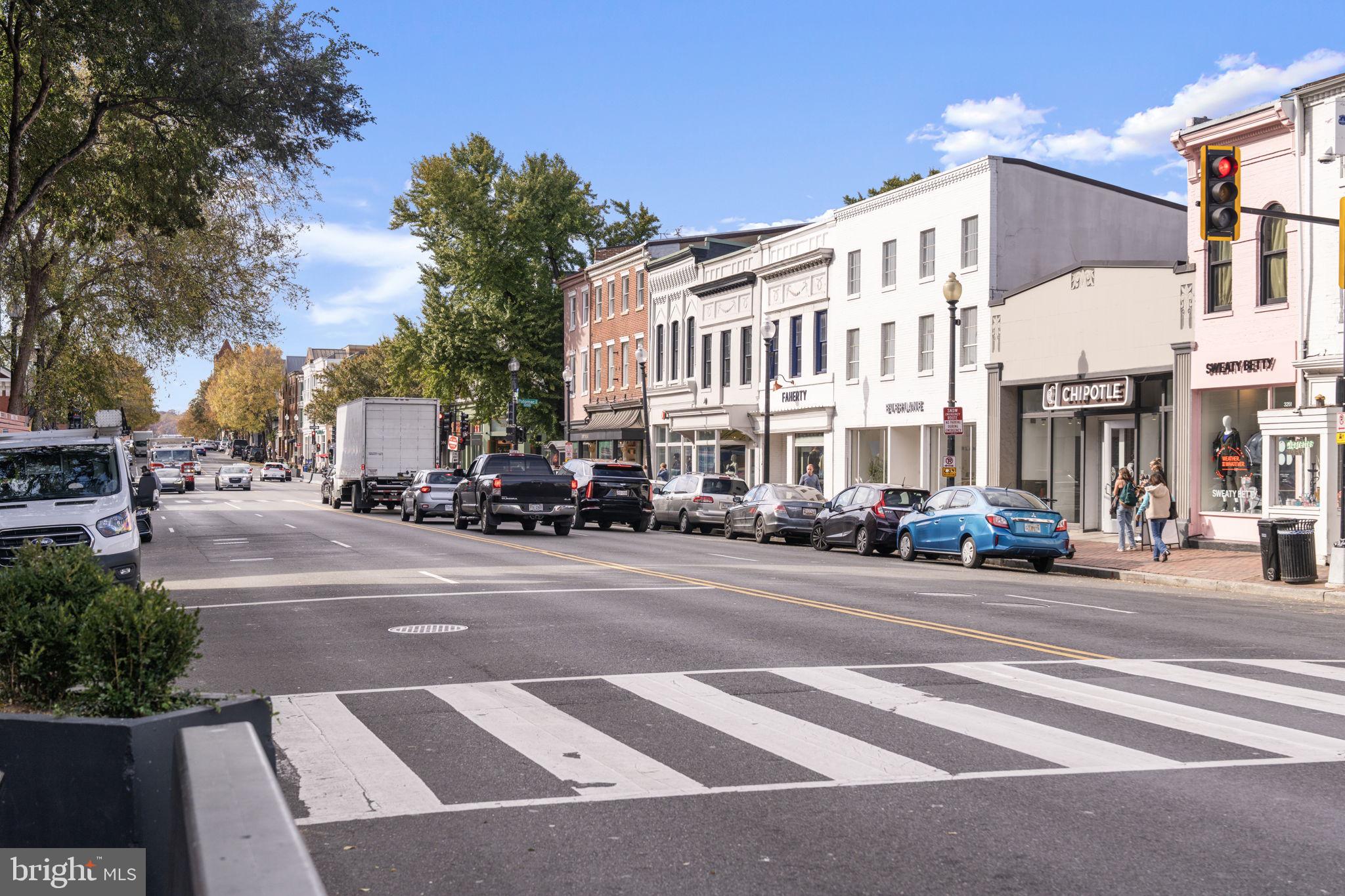 3303 Water Street Northwest, Unit 4B Washington, DC 20007 - Photo 38 of 66 a front view of a building with street view