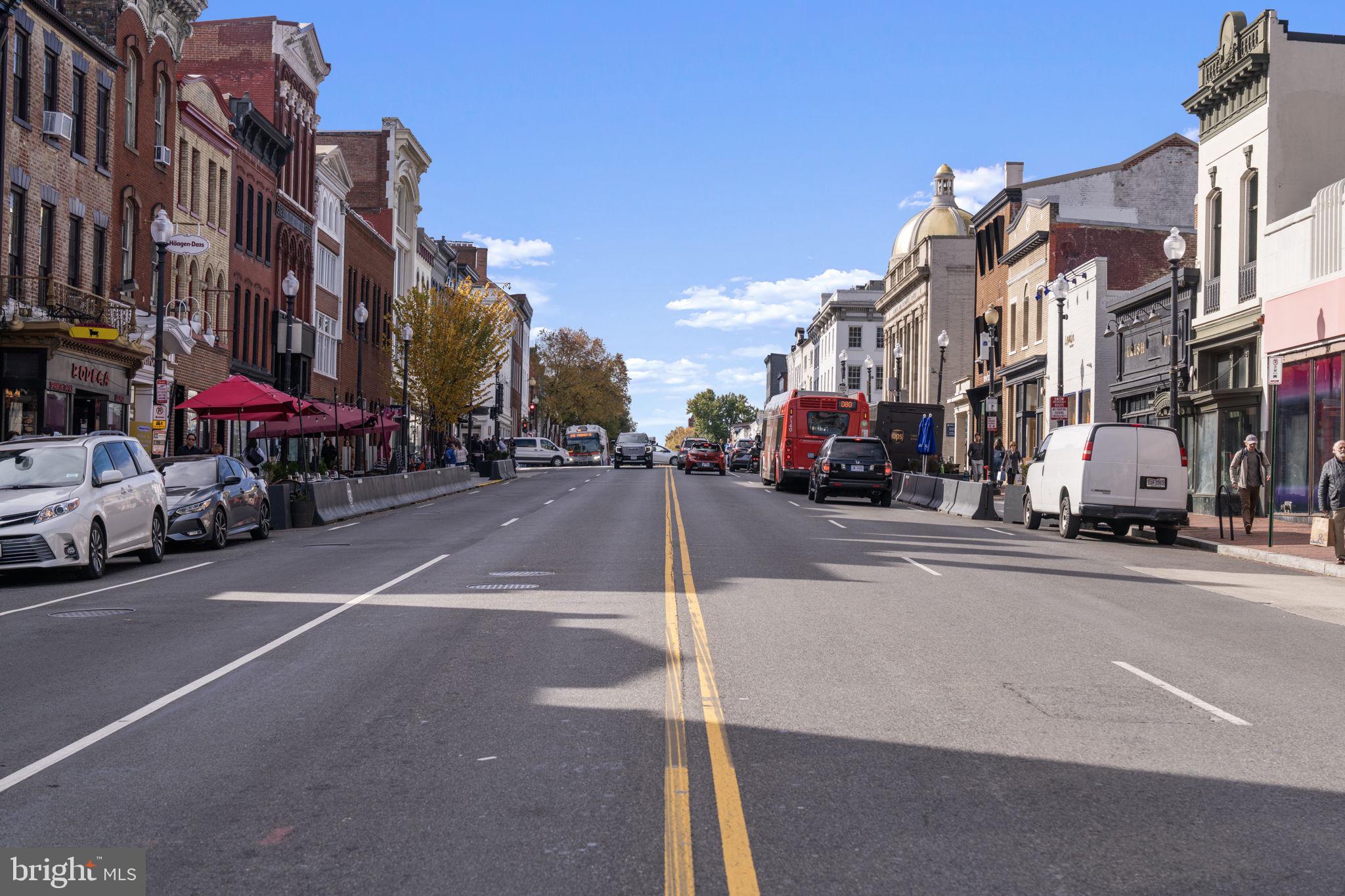 3303 Water Street Northwest, Unit 4B Washington, DC 20007 - Photo 43 of 66 a view of a street with cars