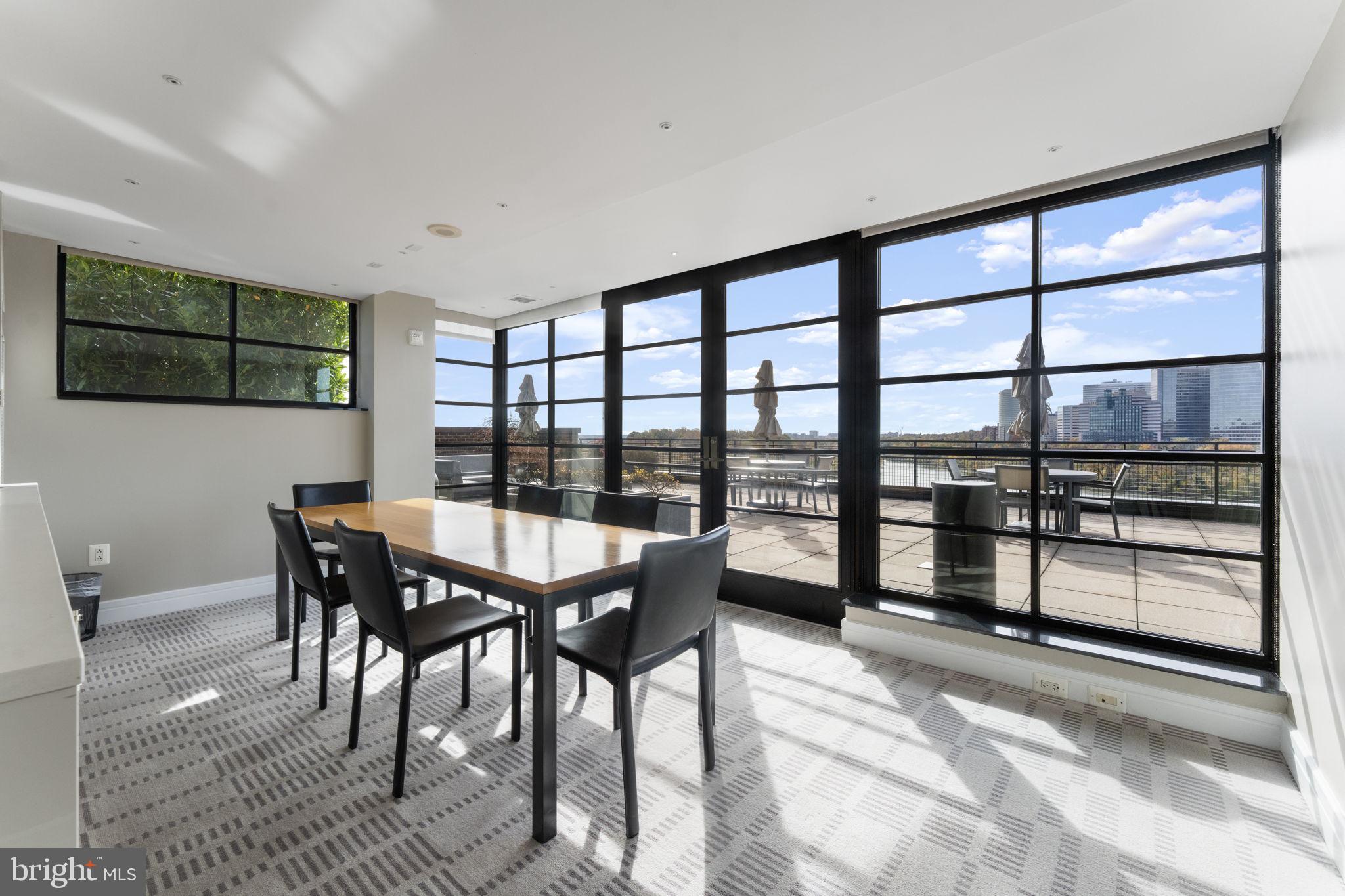 3303 Water Street Northwest, Unit 4B Washington, DC 20007 - Photo 48 of 66 a dining room with furniture and window