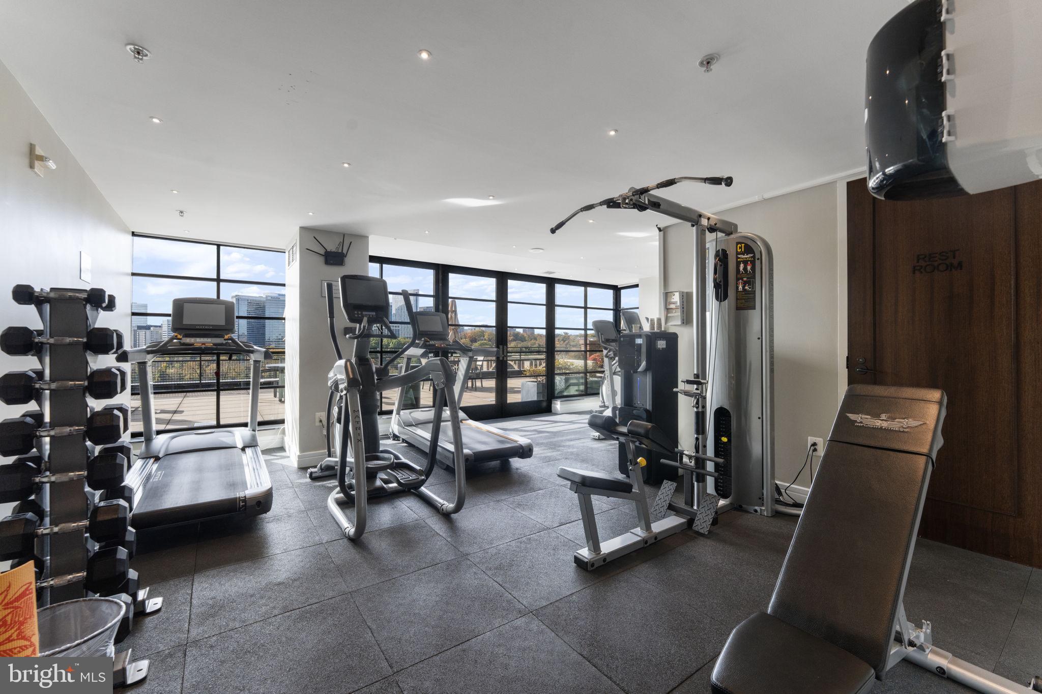 3303 Water Street Northwest, Unit 4B Washington, DC 20007 - Photo 54 of 66 a view of a room with gym equipment