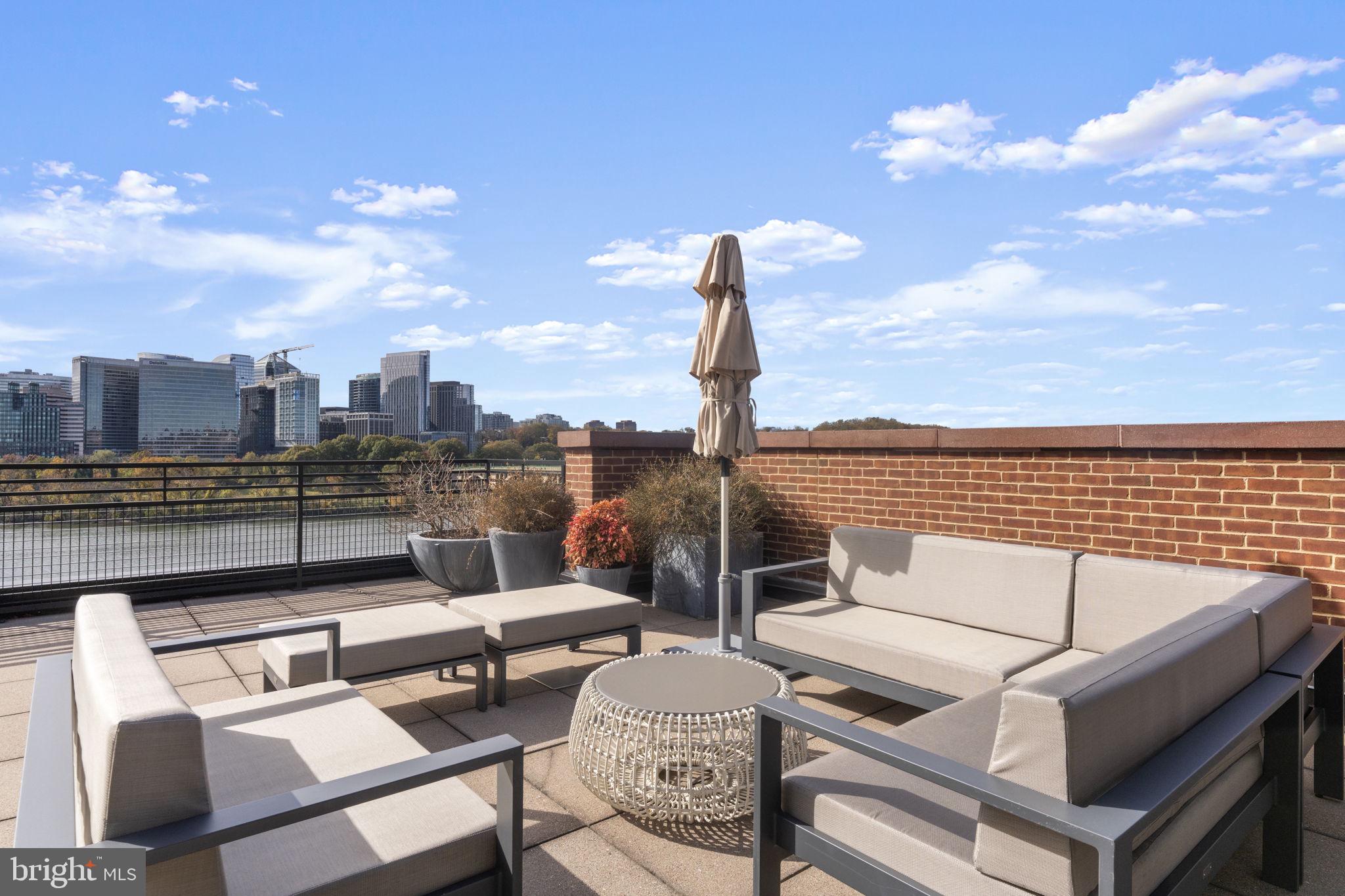 3303 Water Street Northwest, Unit 4B Washington, DC 20007 - Photo 55 of 66 a view of a terrace with furniture