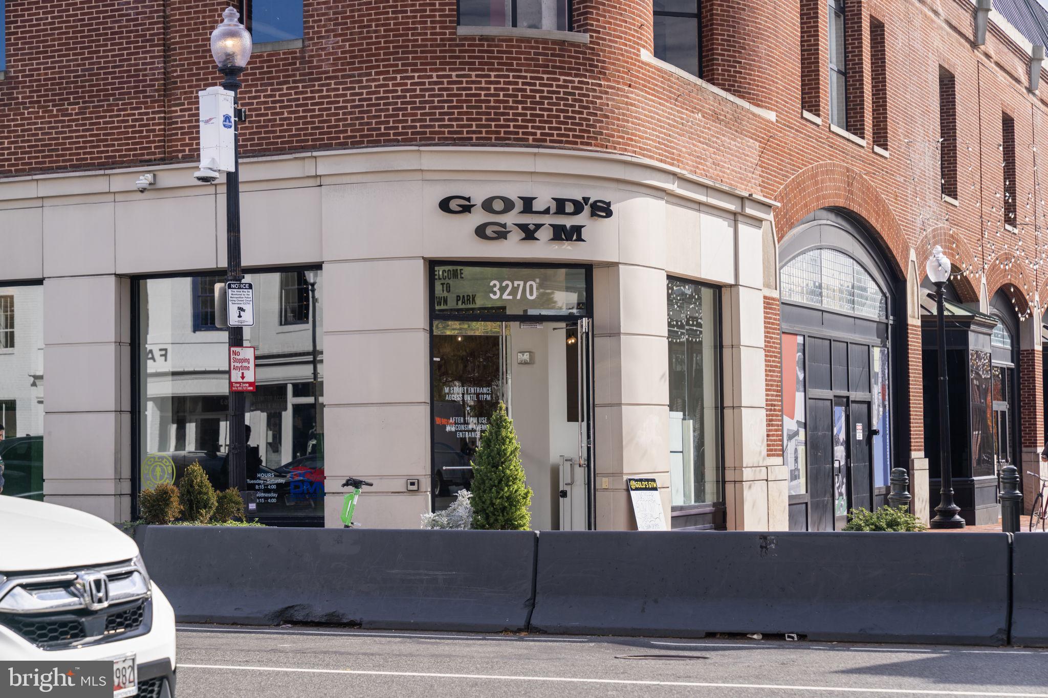 3303 Water Street Northwest, Unit 4B Washington, DC 20007 - Photo 65 of 66 a view of a building with car parked