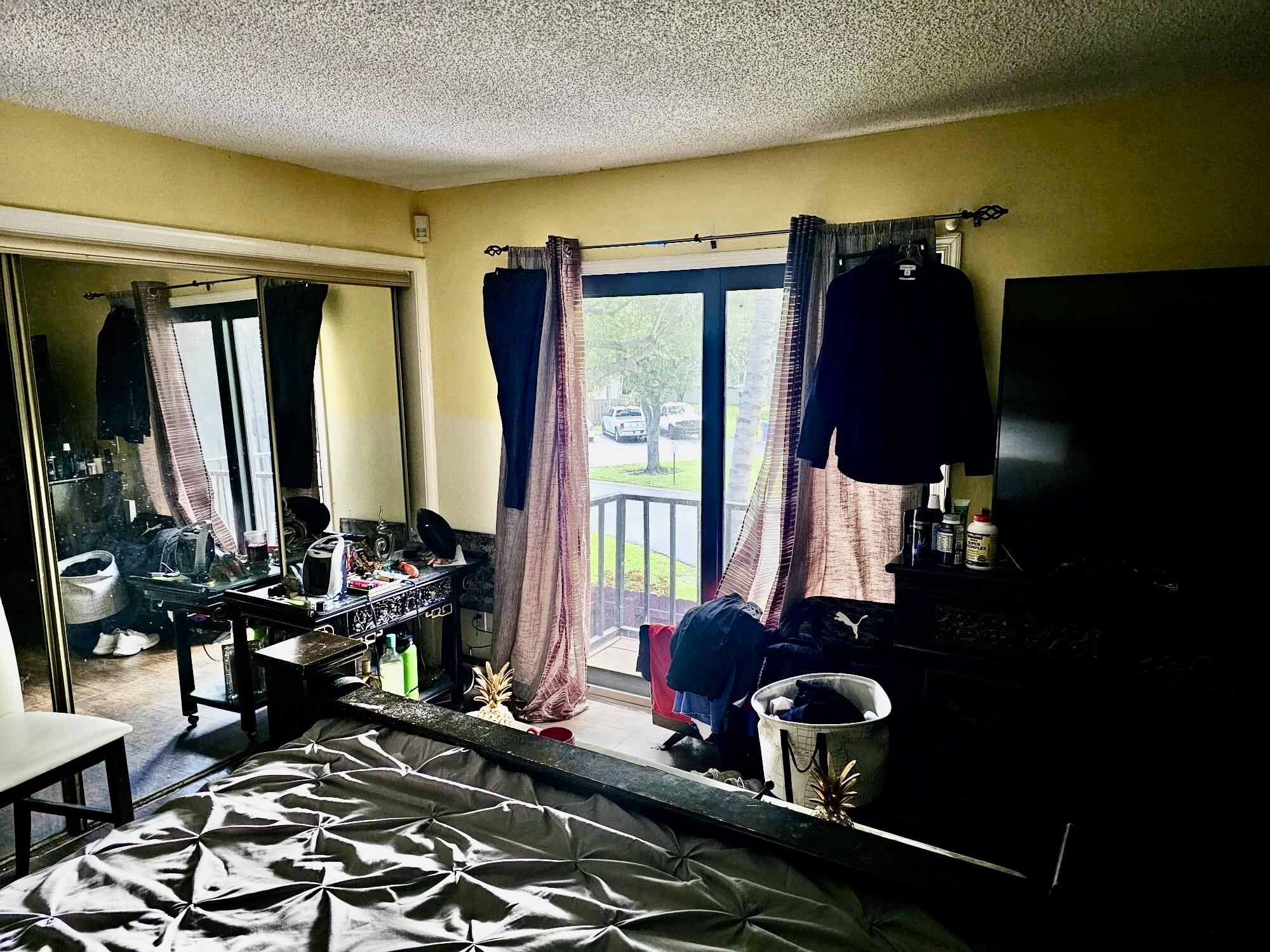 2860 Kirk Road Lake Worth, FL 33461 - Photo 12 of 13 a room with furniture or couch and a window