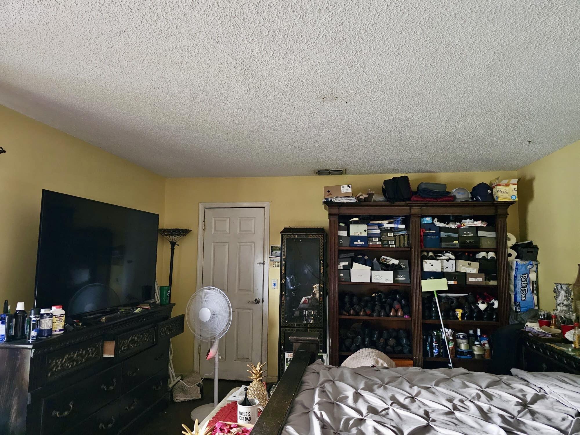 2860 Kirk Road Lake Worth, FL 33461 - Photo 10 of 13 a living room with lots of furniture and a flat screen tv