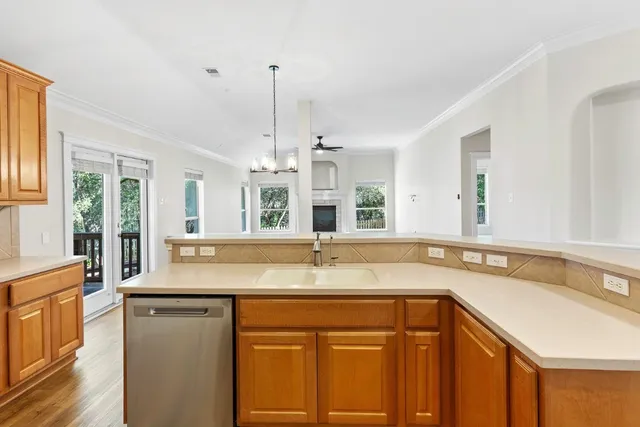 a kitchen with a sink and a window
