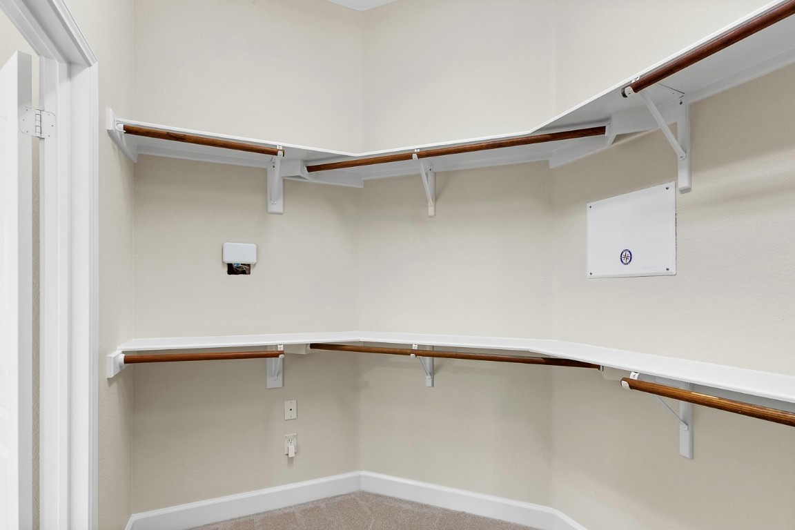 10805 Ariock Lane Austin, TX 78739 - Photo 19 of 40 Spacious closet with carpet floors
