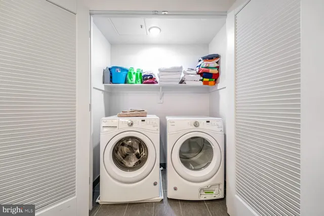 a utility room with dryer and washer