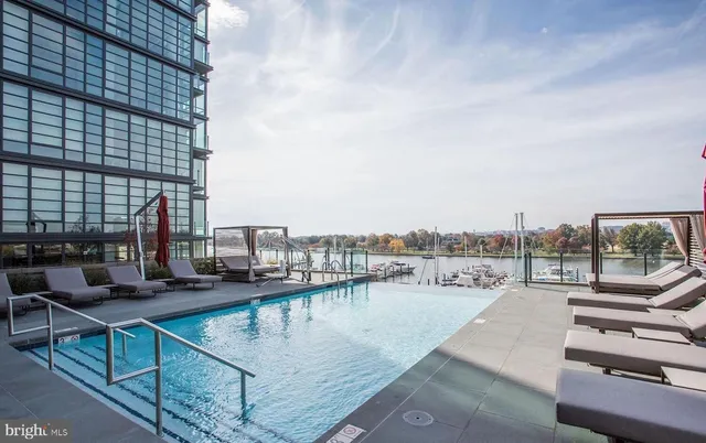 a view of roof deck with patio