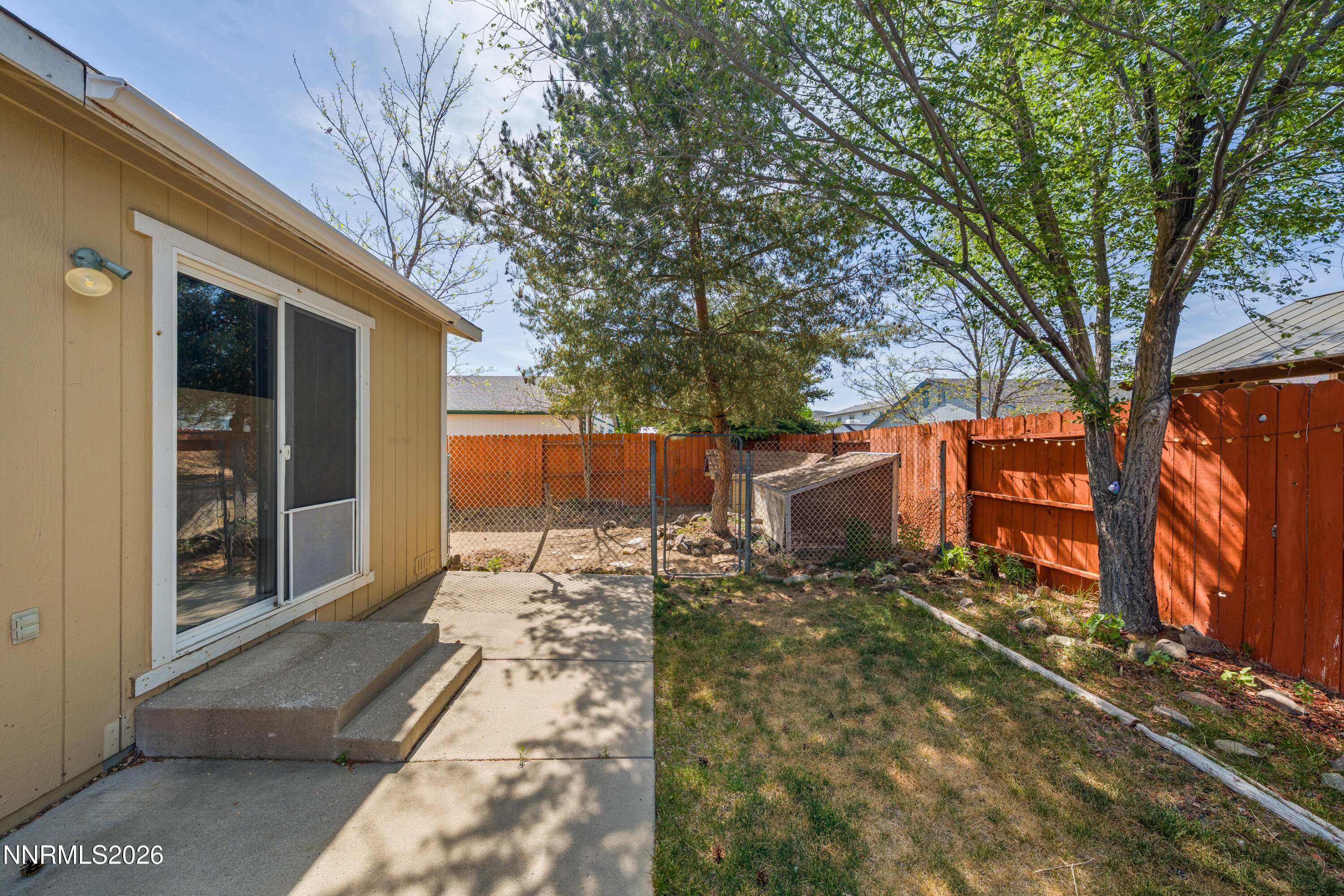 17617 Grand Valley Court Reno, NV 89508 - Photo 12 of 15 a backyard of a house with seating space