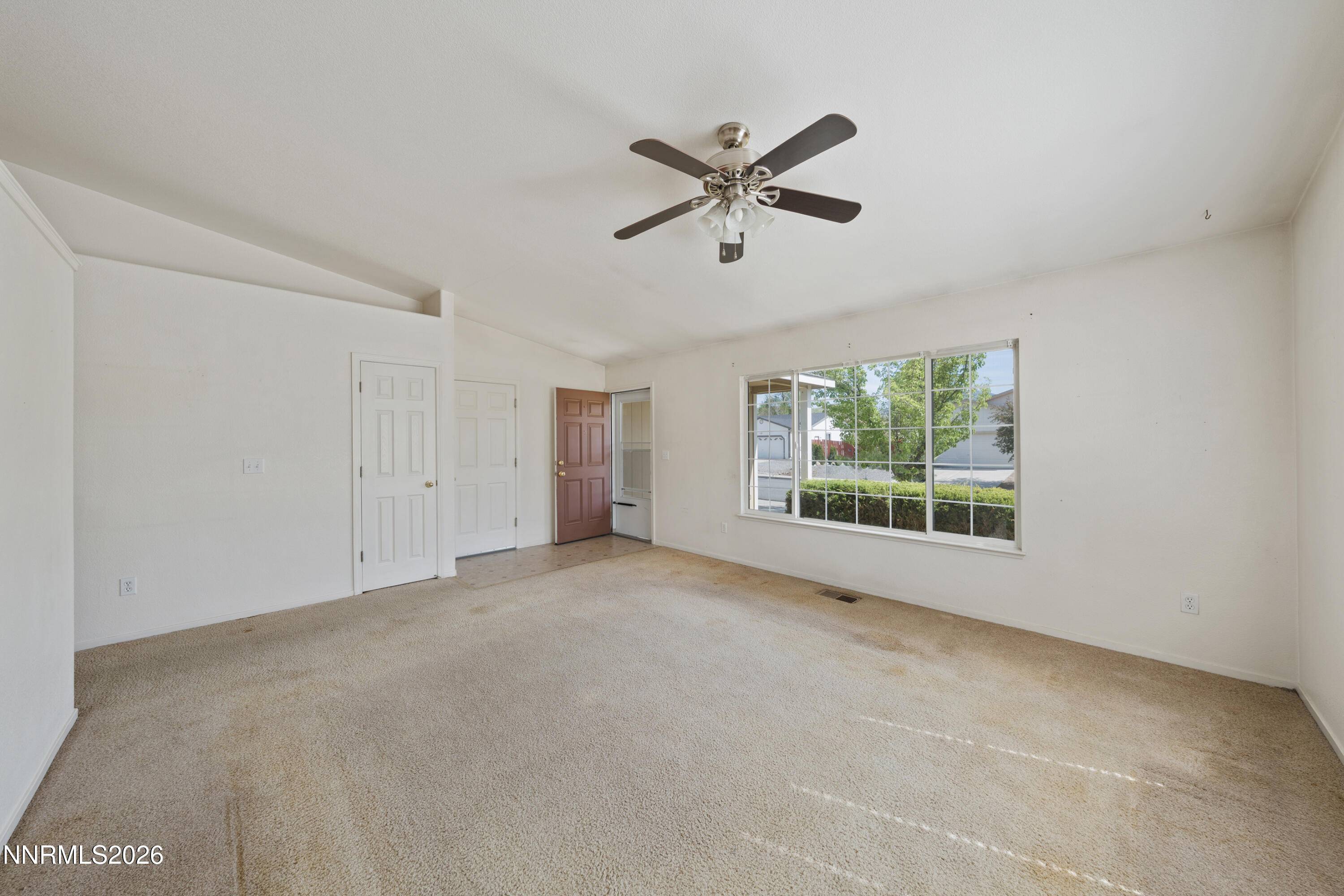 17617 Grand Valley Court Reno, NV 89508 - Photo 3 of 15 a view of an empty room with a window