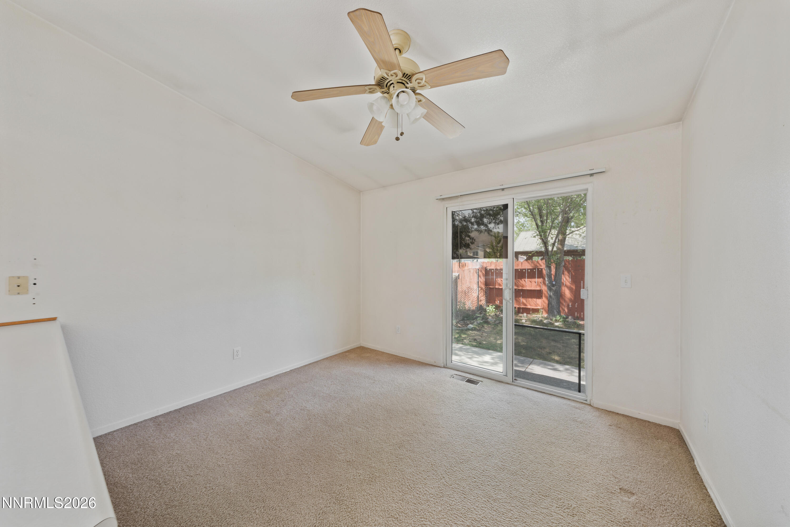17617 Grand Valley Court Reno, NV 89508 - Photo 6 of 15 an empty room with fan