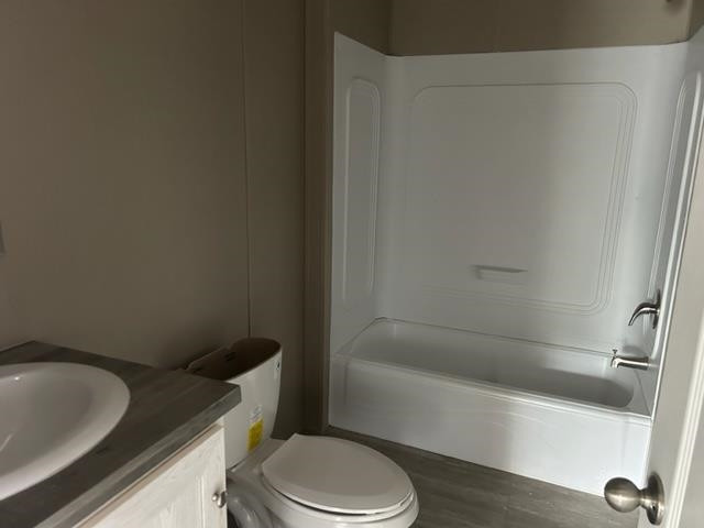 2958 Basstown Road Clinton, NC 28328 - Photo 2 of 7 a bathroom with a granite countertop bathtub sink vanity mirror and toilet