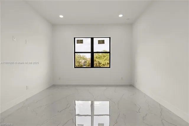 an empty room with a window