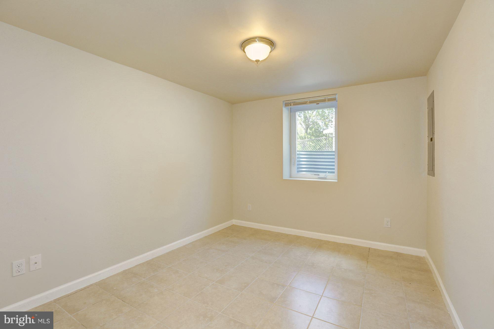 12005 Dewey Road Silver Spring, MD 20906 - Photo 23 of 30 Lower-Level Apartment/In-Law Suite Bedroom 1