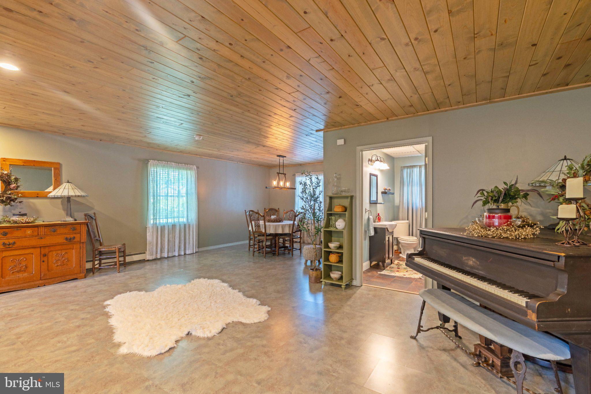 1002 Maple Lane Tyrone, PA 16686 - Photo 24 of 71 Spacious living area with rustic charm.