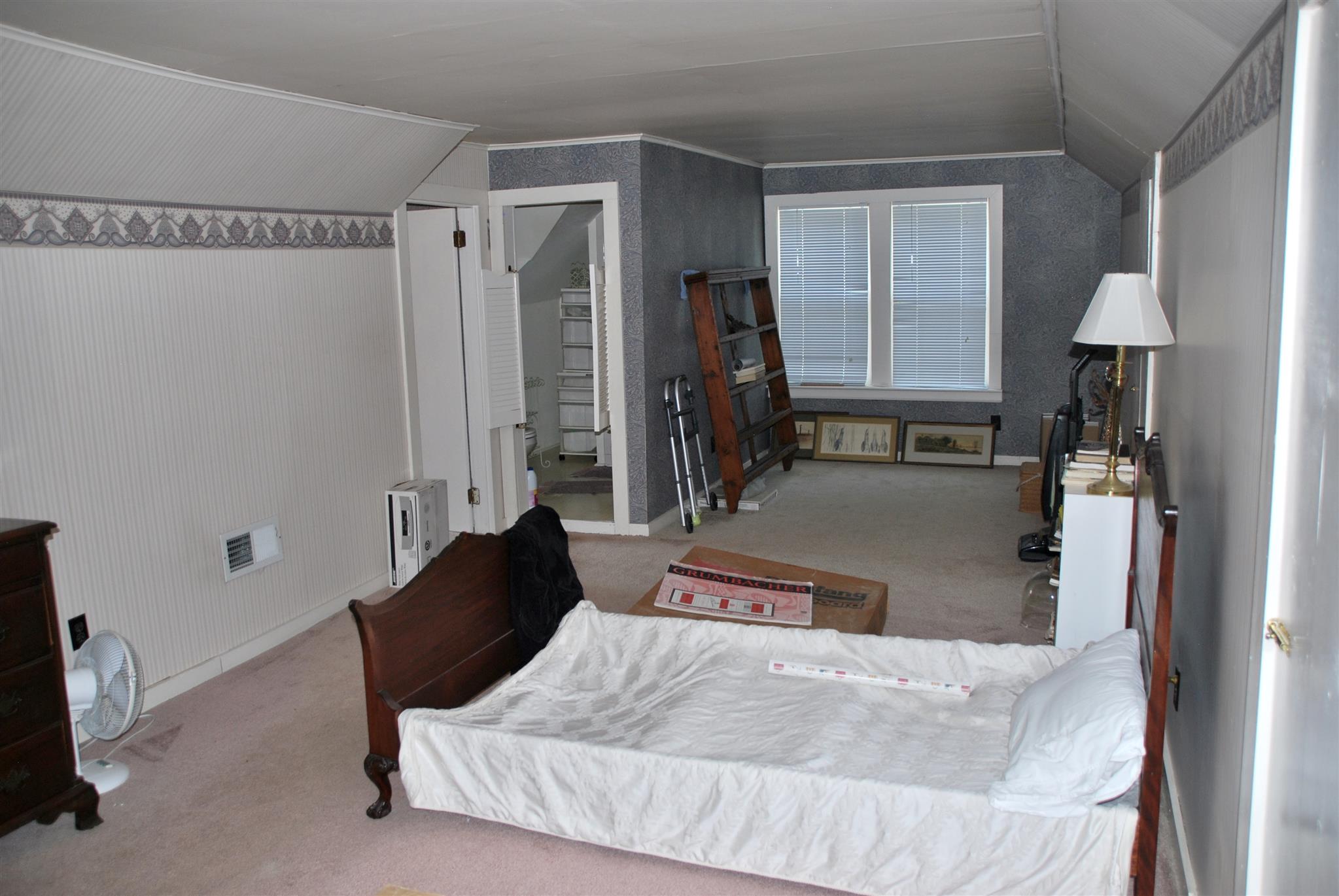 906 Estes Road Nashville, TN 37215 - Photo 12 of 15 a bedroom with bed and a window