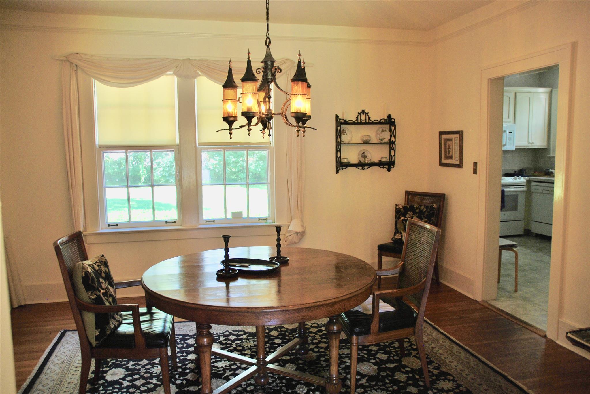 906 Estes Road Nashville, TN 37215 - Photo 5 of 15 a view of a dining room with furniture window and outside view