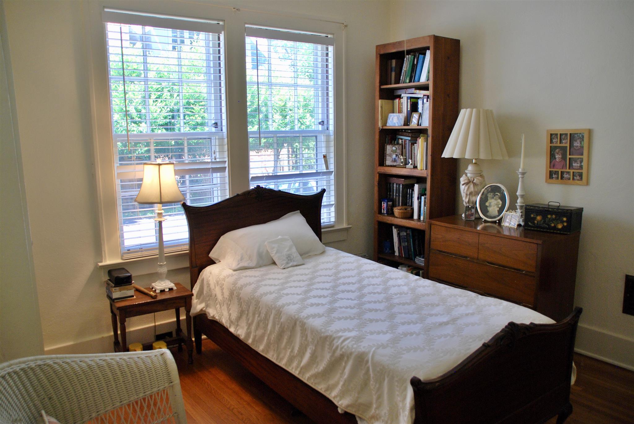 906 Estes Road Nashville, TN 37215 - Photo 10 of 15 a bedroom with a bed and a book shelf