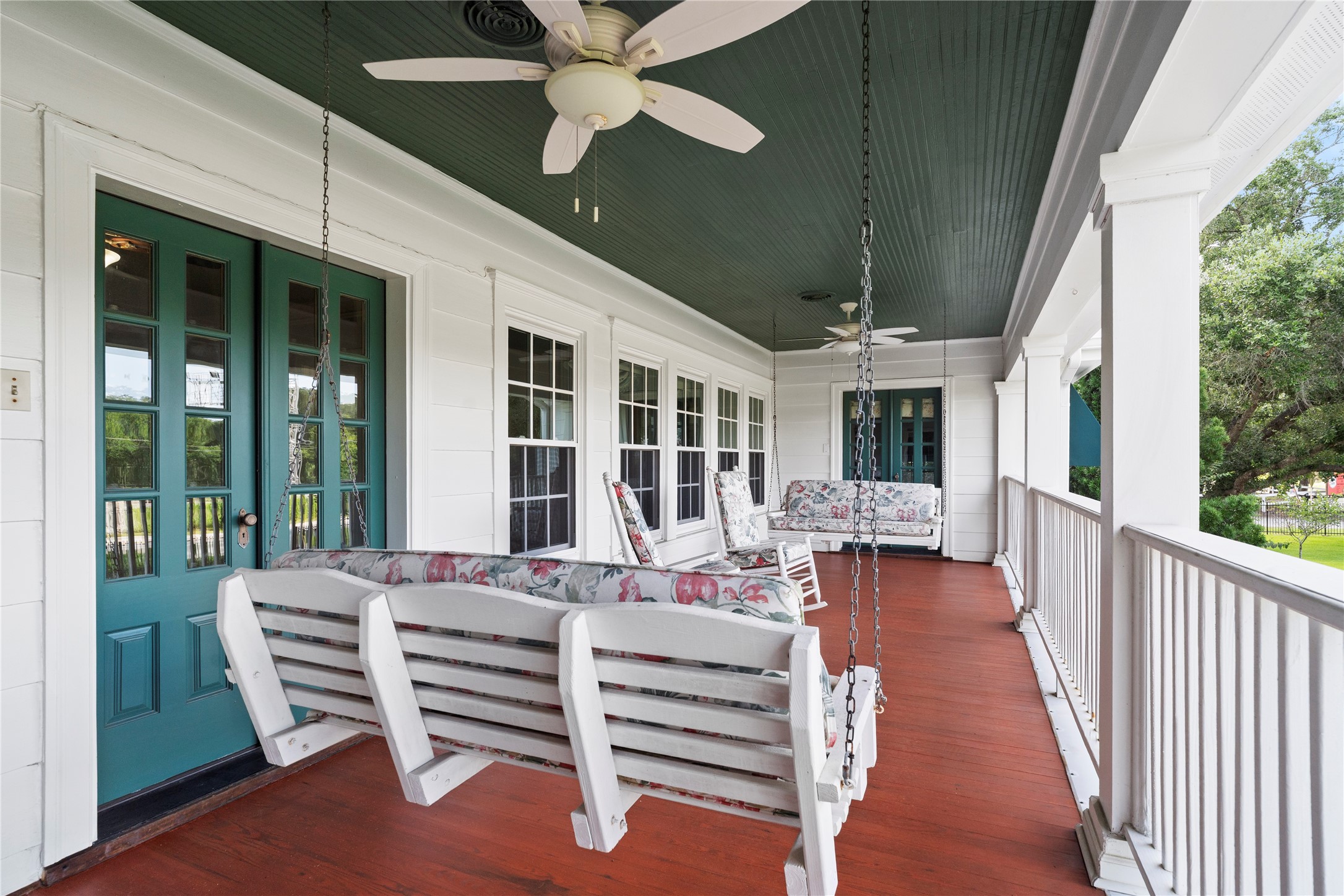 9827 FM 2759 Road Richmond, TX 77469 - Photo 40 of 50 a view of a patio with a table chairs and a floor to ceiling window
