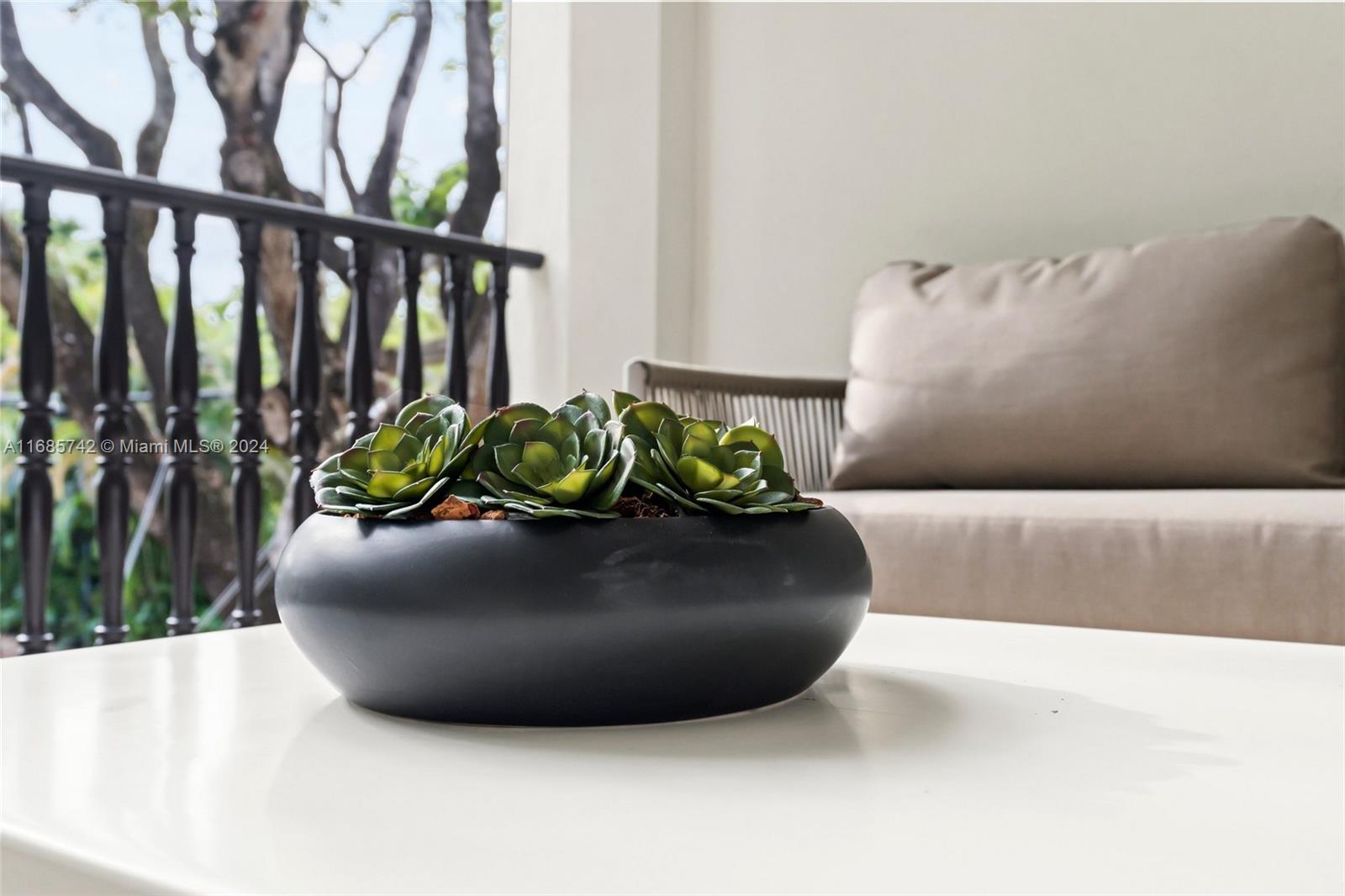 2619 Anderson Road Coral Gables, FL 33134 - Photo 12 of 63 a view of a potted plant in a garden