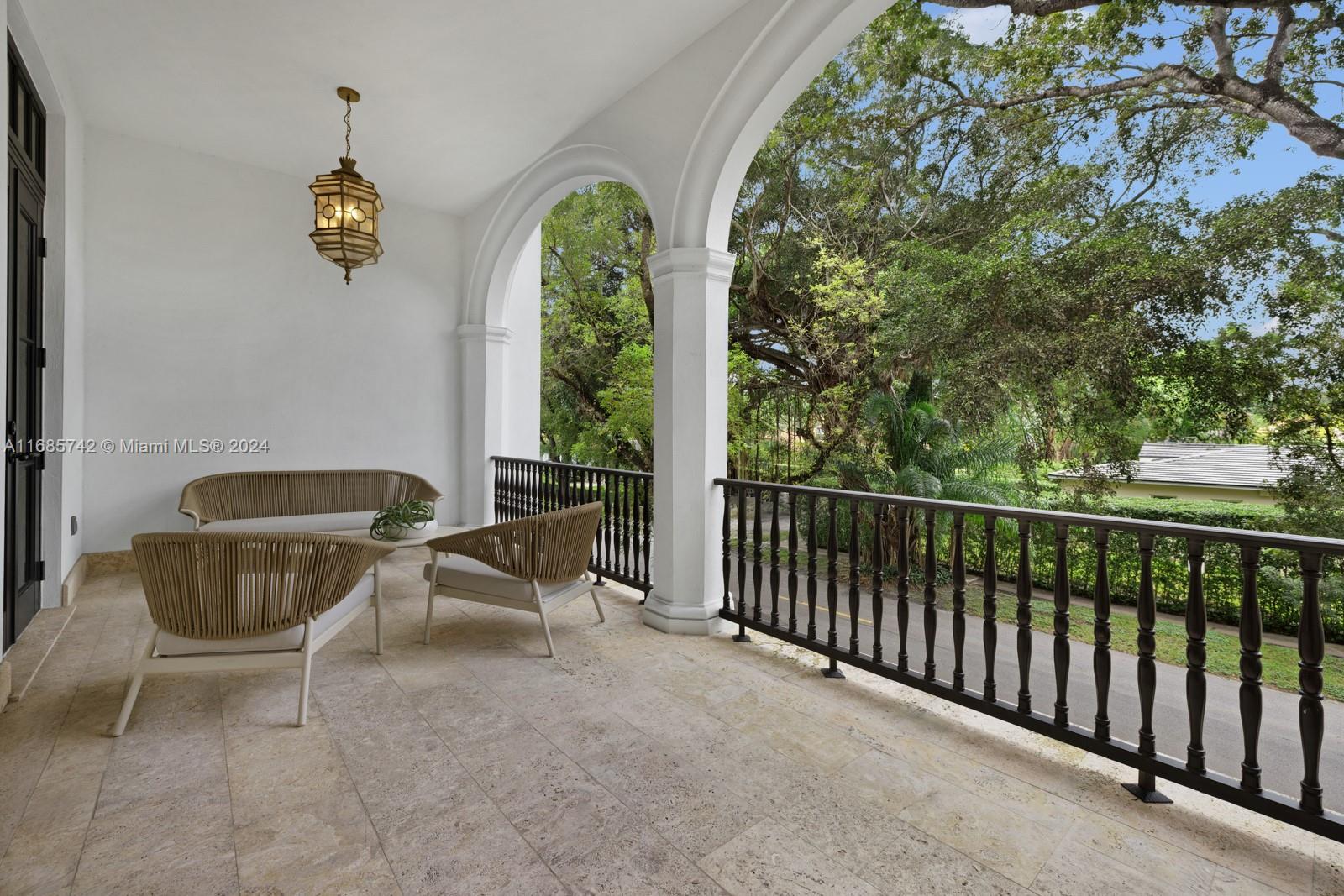 2619 Anderson Road Coral Gables, FL 33134 - Photo 24 of 63 a view of a patio and fire pit
