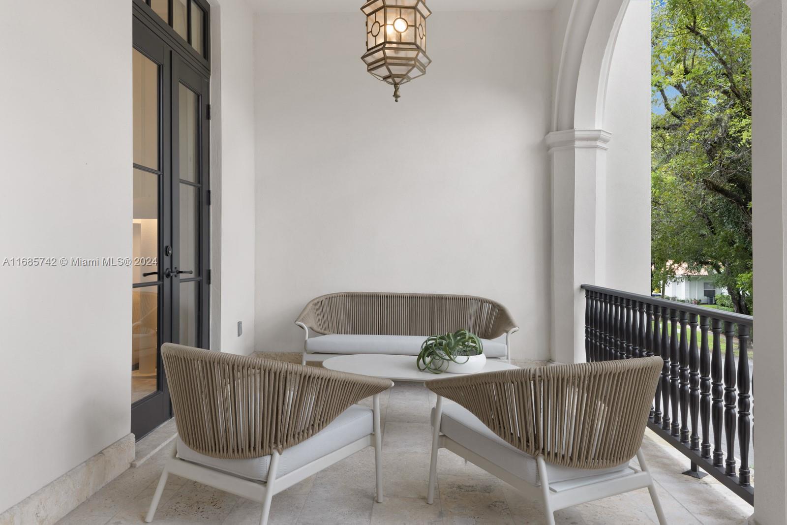 2619 Anderson Road Coral Gables, FL 33134 - Photo 25 of 63 a view of a chair in the balcony