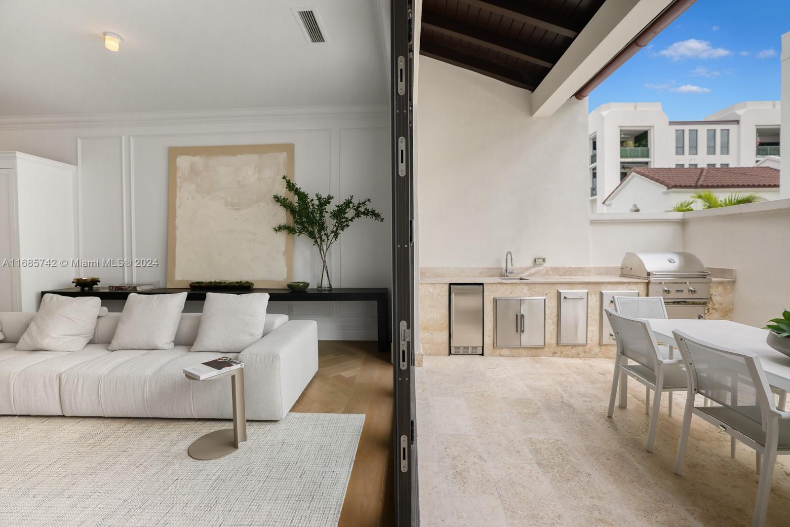 2619 Anderson Road Coral Gables, FL 33134 - Photo 40 of 63 a living room with furniture and a rug