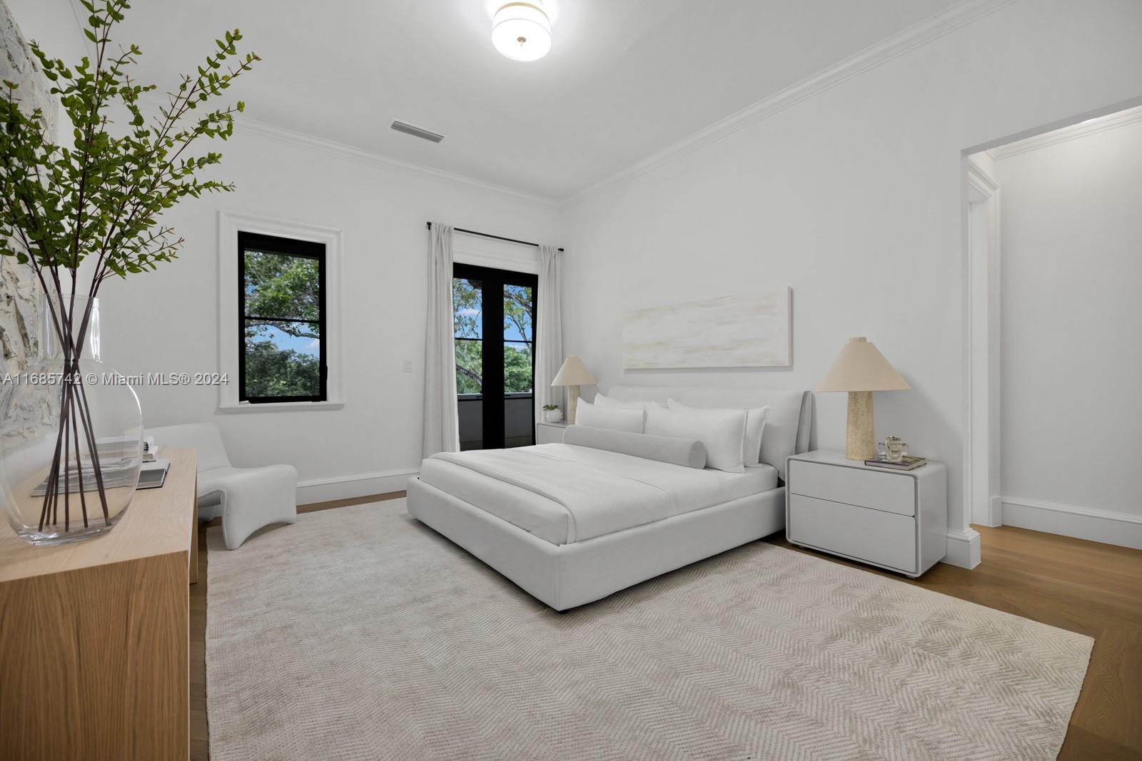 2619 Anderson Road Coral Gables, FL 33134 - Photo 43 of 63 a living room with furniture and a potted plant