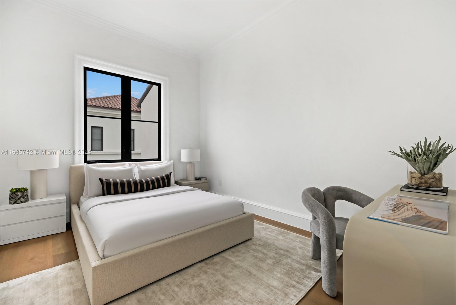 2619 Anderson Road Coral Gables, FL 33134 - Photo 51 of 63 a bedroom with a bed and a large window