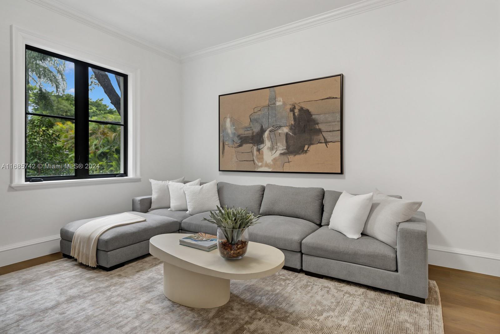 2619 Anderson Road Coral Gables, FL 33134 - Photo 56 of 63 a living room with furniture and a large window