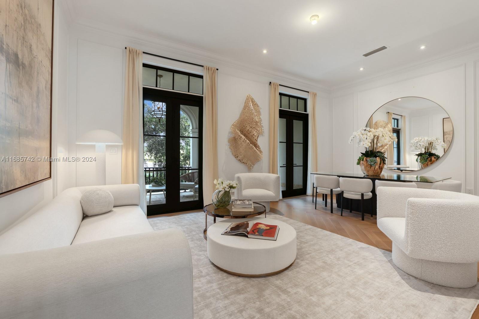 2619 Anderson Road Coral Gables, FL 33134 - Photo 7 of 63 a living room with furniture and a potted plant
