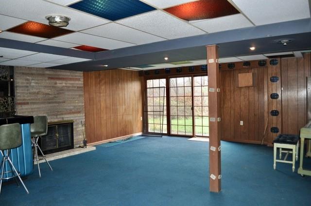 305 Parkhill Road Baden, PA 15005 - Photo 14 of 15 a view of an empty room with a fireplace and a window