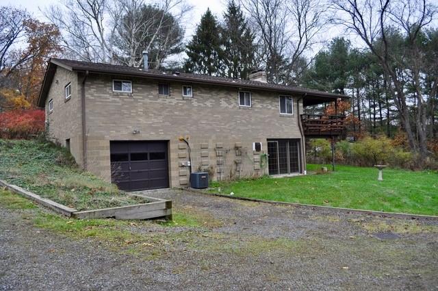 305 Parkhill Road Baden, PA 15005 - Photo 3 of 15 a front view of a house with garden