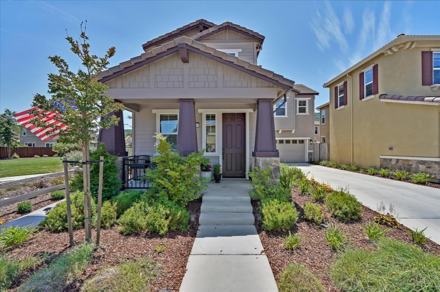2580 Apple Tree Way Gilroy, CA 95020 - Photo 3 of 45 a front view of a house with garden