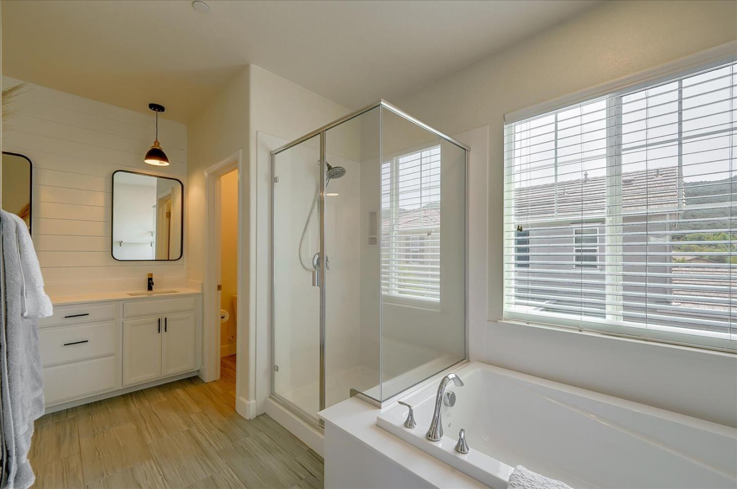 2580 Apple Tree Way Gilroy, CA 95020 - Photo 31 of 45 a bathroom with a tub sink and mirror